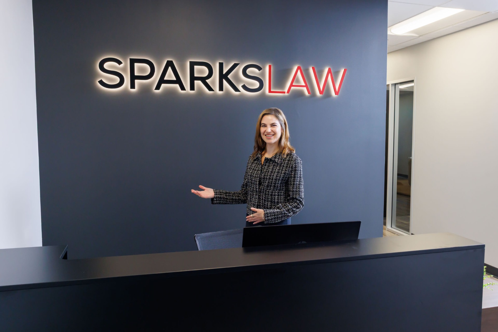 Sparks Law reception with wall signage