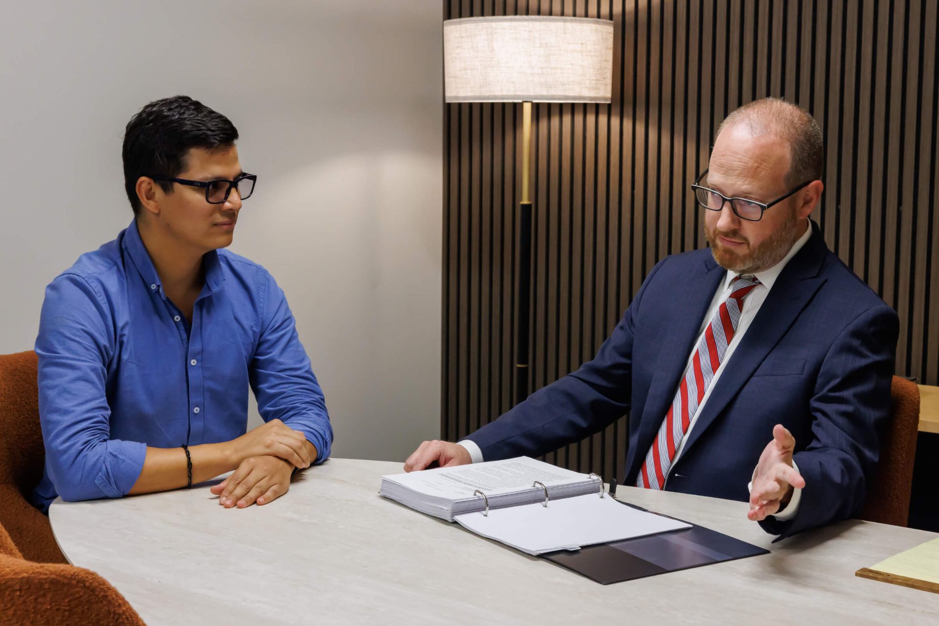 Sparks Law attorney meeting with a client